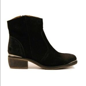 Black swede, ankle heeled boots.